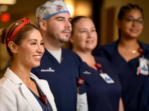 Team of 4 nurses, smiling