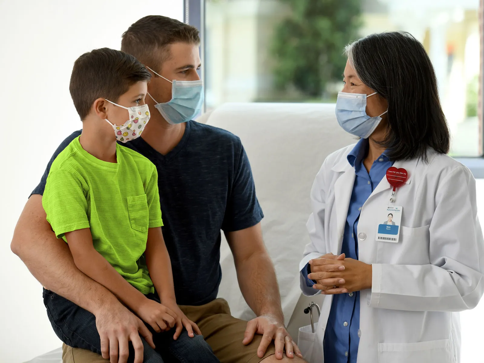 A father talking to a pediatric doctor