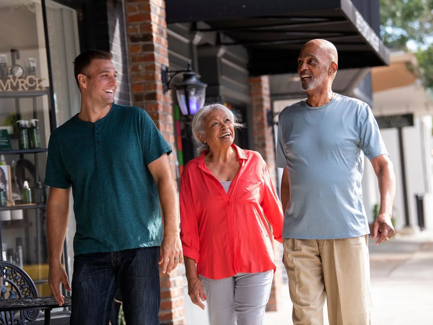 Hispanic family walking outside shops