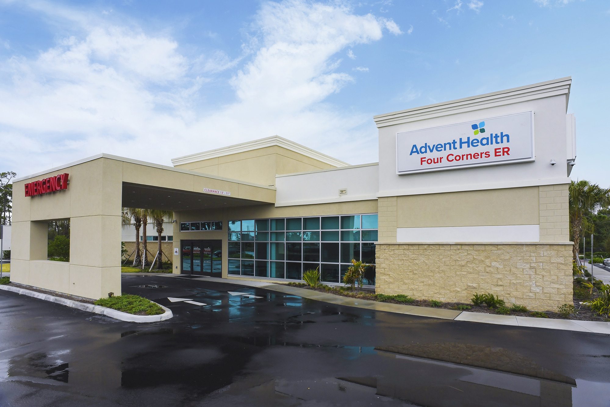 Exterior of AdventHealth Four Corners ER showing the main entrance and emergency canopy.