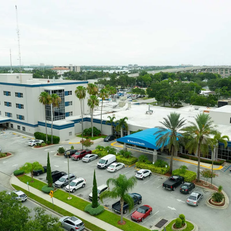 A bird's-eye view of the AdventHealth New Smyrna building and surrounding area.